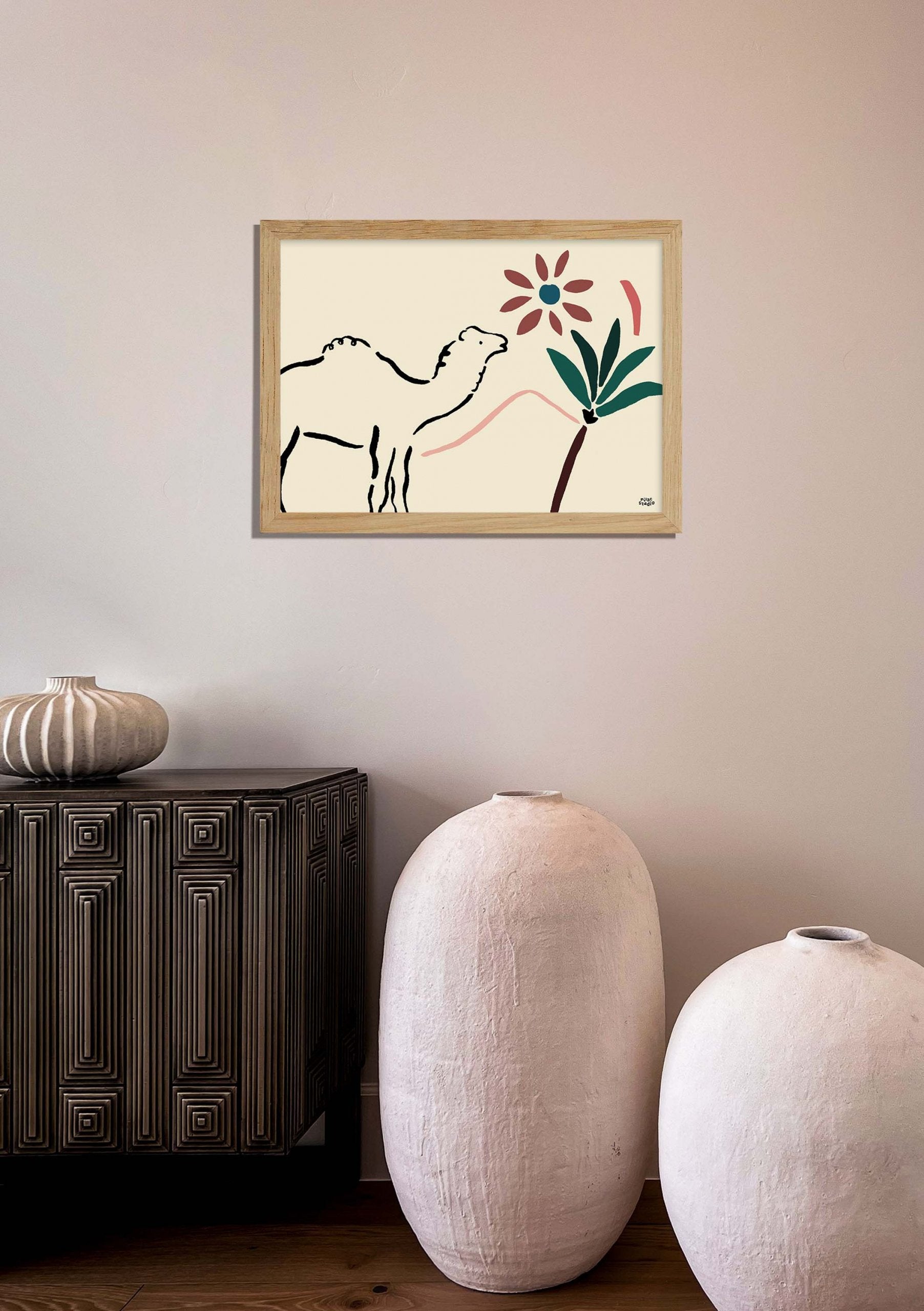 Art abstrait avec une silhouette de chameau et une fleur