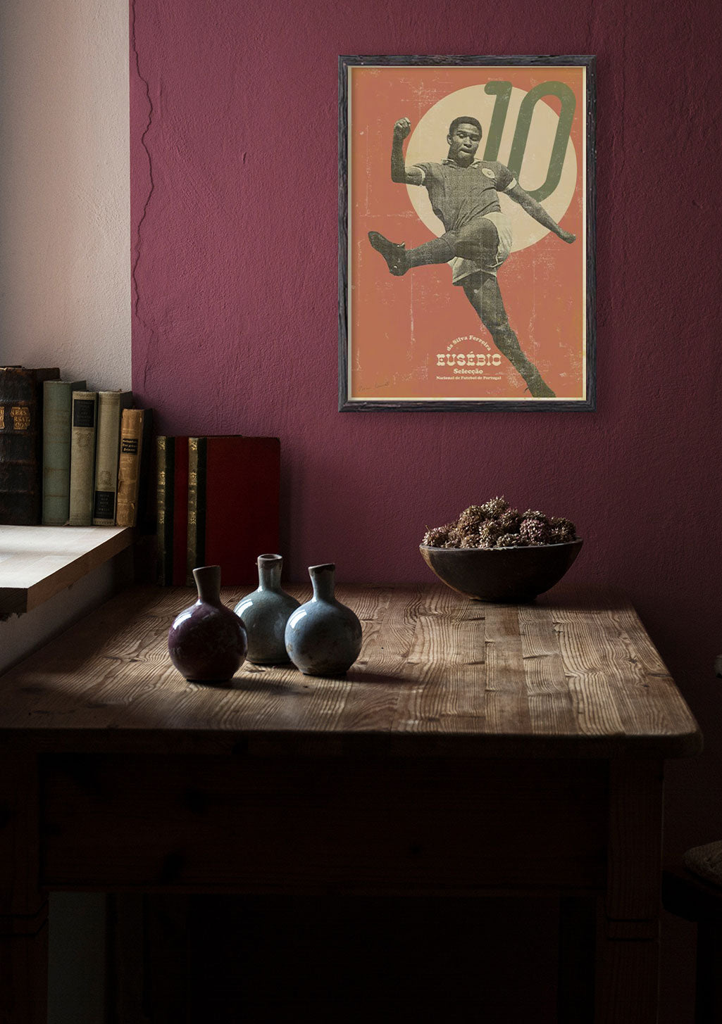Poster de football avec le numéro 10, joueur célébrant, mur rouge