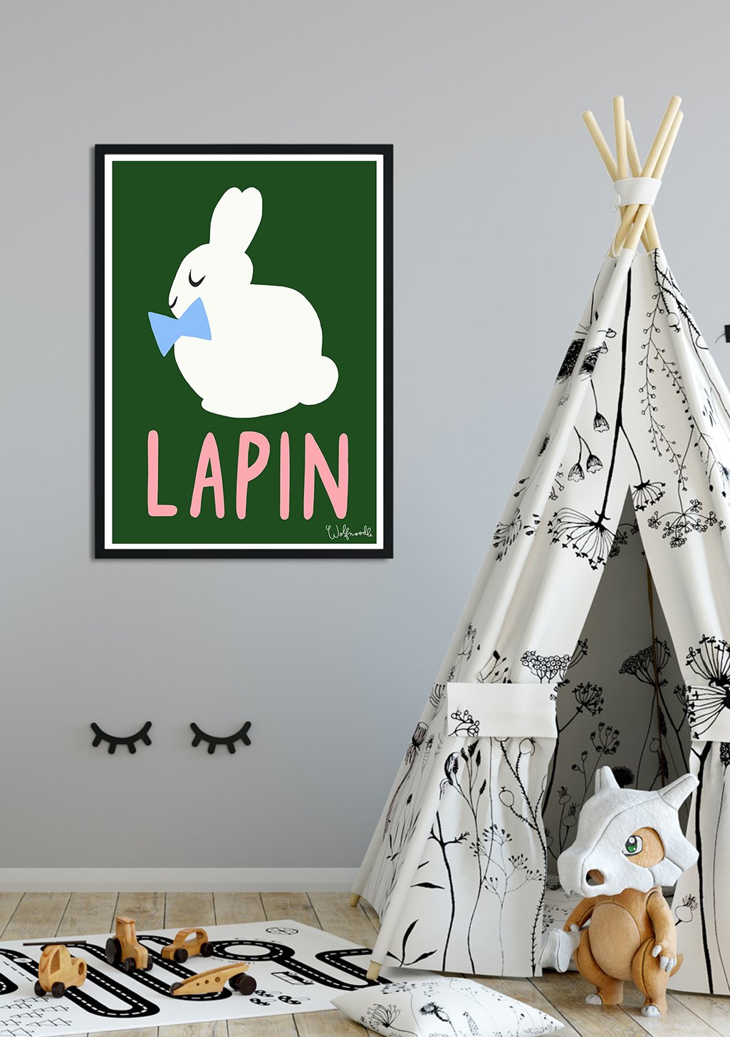 Lapin vert avec nœud papillon bleu, texte rose LAPIN