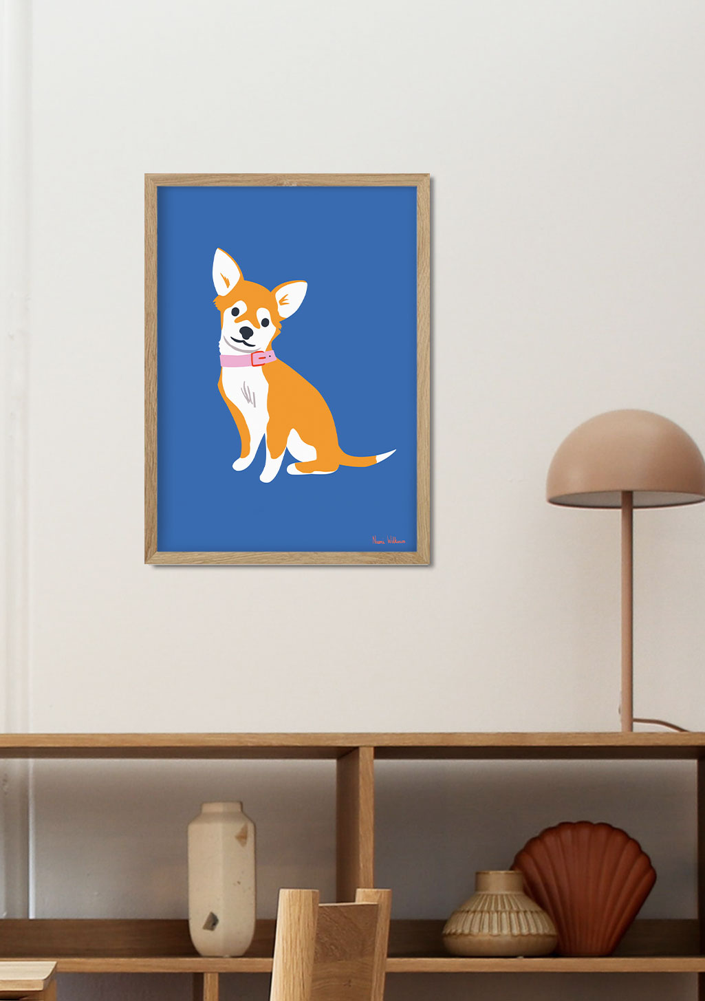 Chiot corgi marron et blanc sur fond bleu