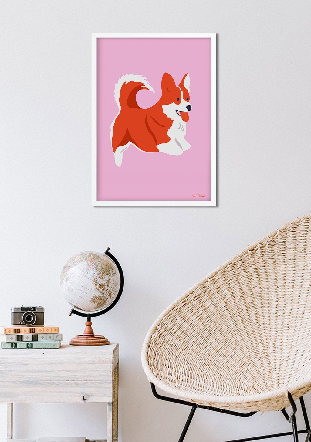 Chien corgi rouge et blanc sur fond rose