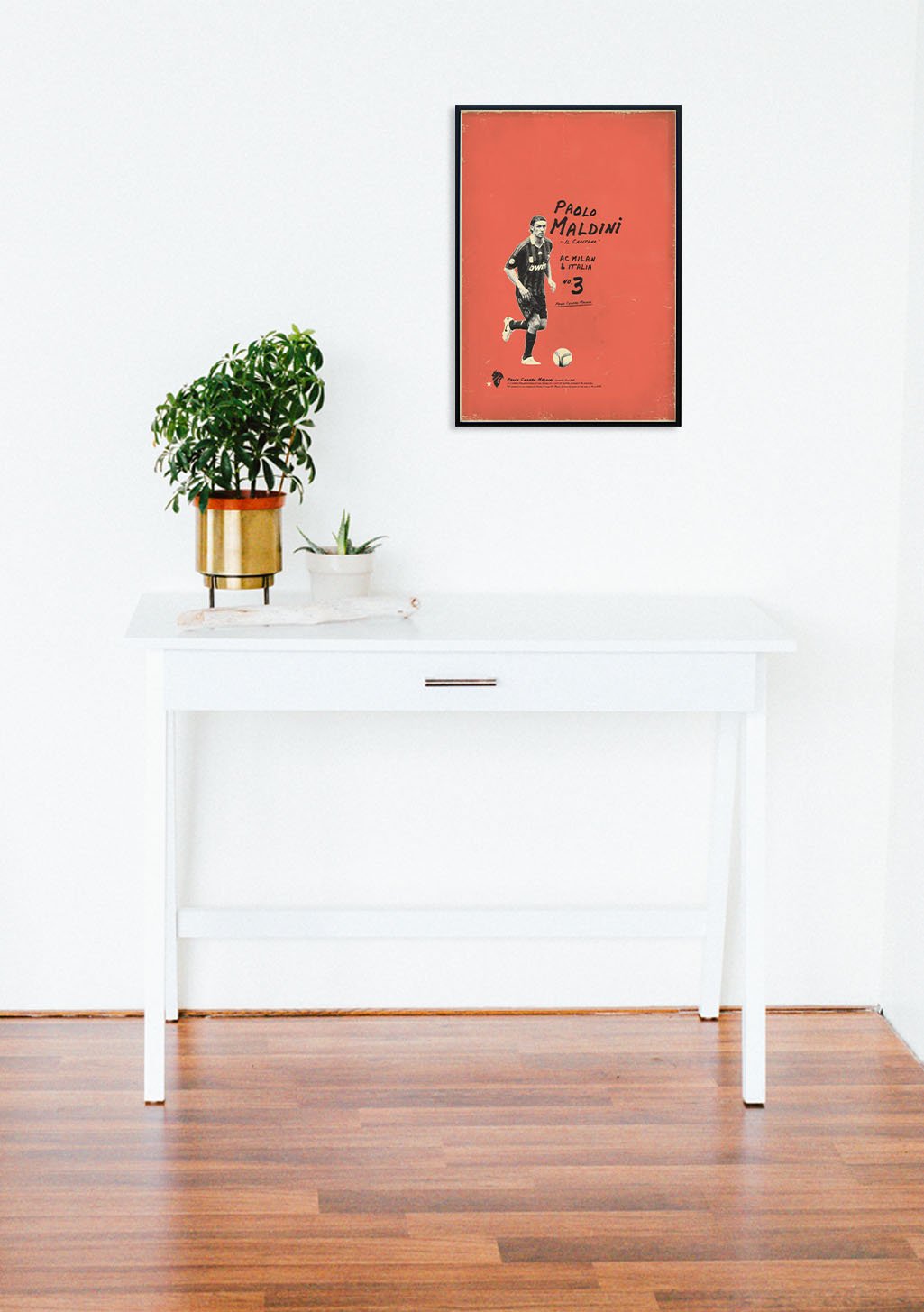 Poster rouge avec homme et texte "Polo Maldini"