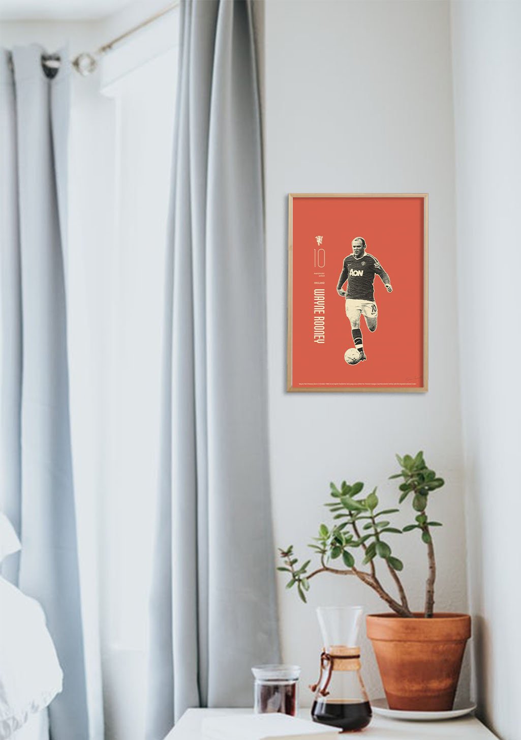 Poster de football, joueur, maillot noir, numéro 10, texte blanc, fond rouge