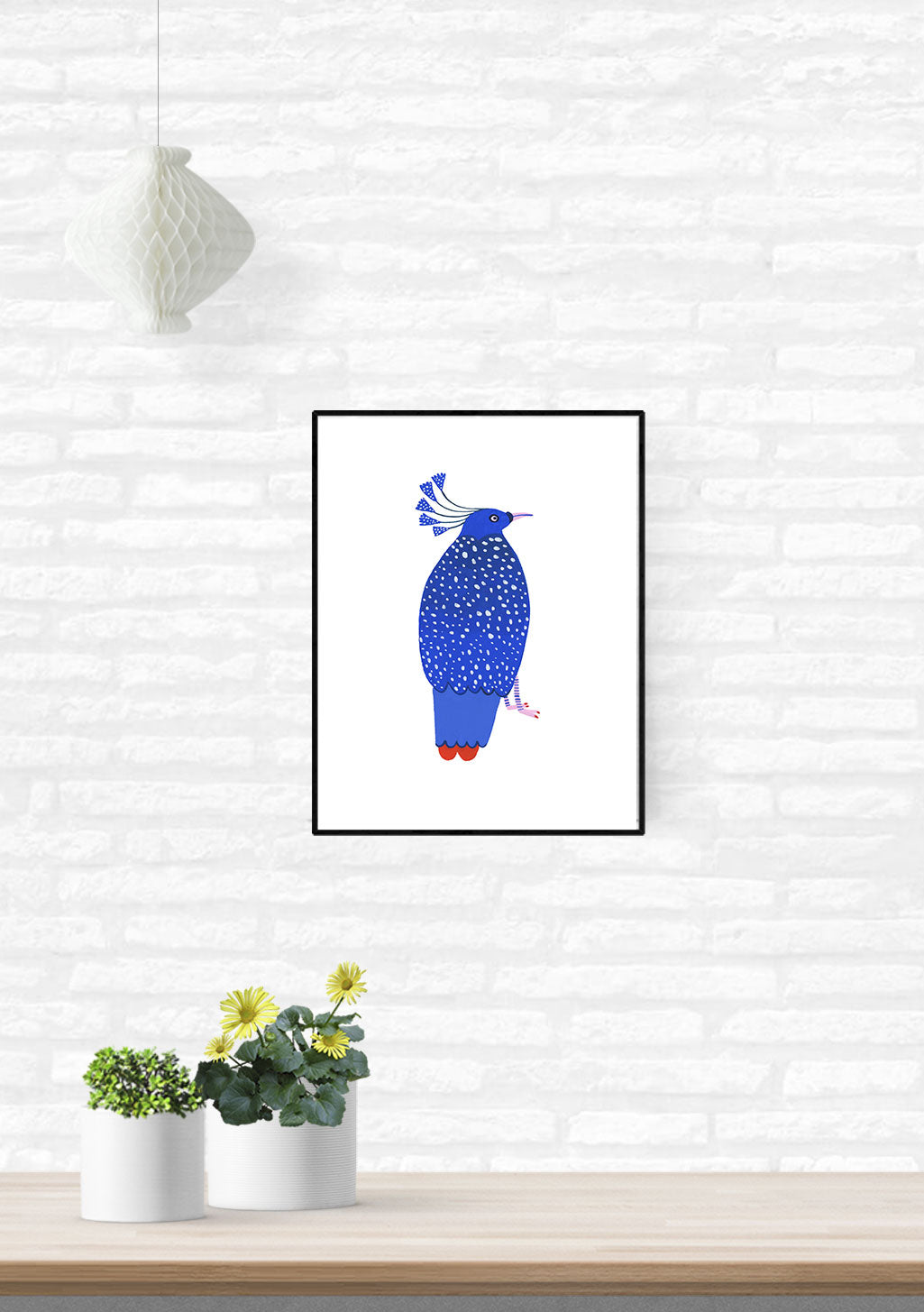 Oiseau bleu stylisé avec des pois et une crête