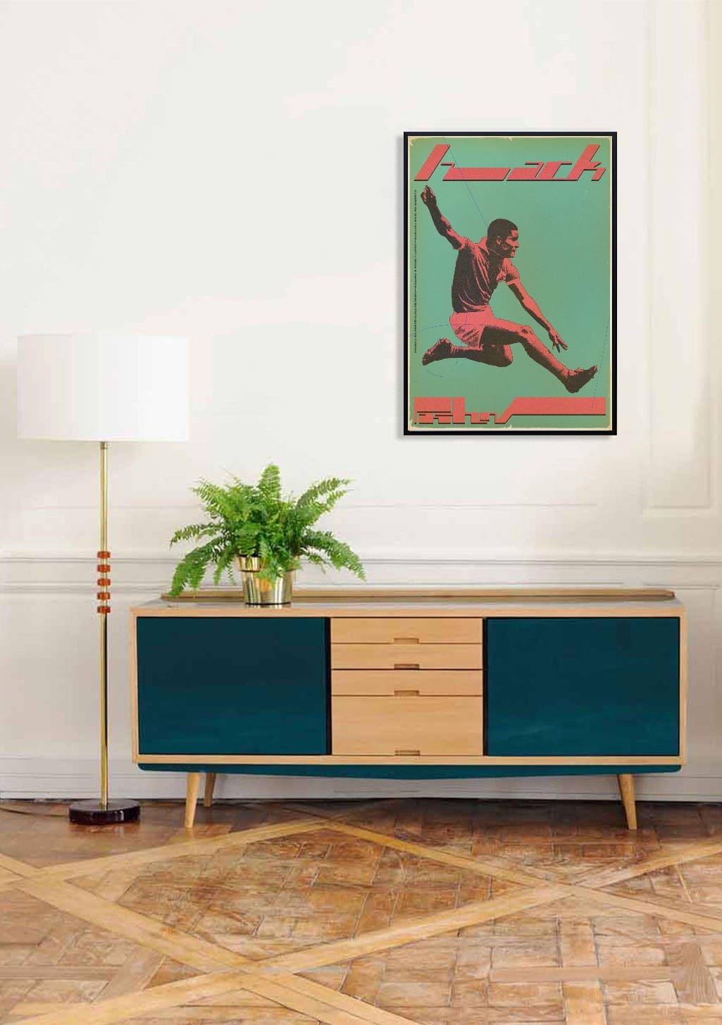 Poster de football, joueur sautant, vert et rouge, mur blanc