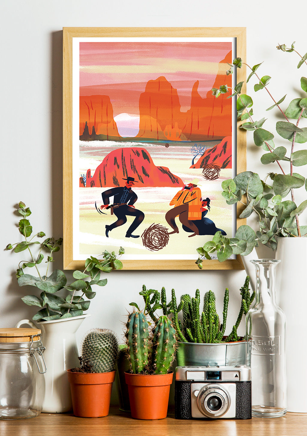 Poster de deux personnes dans un paysage désertique orange